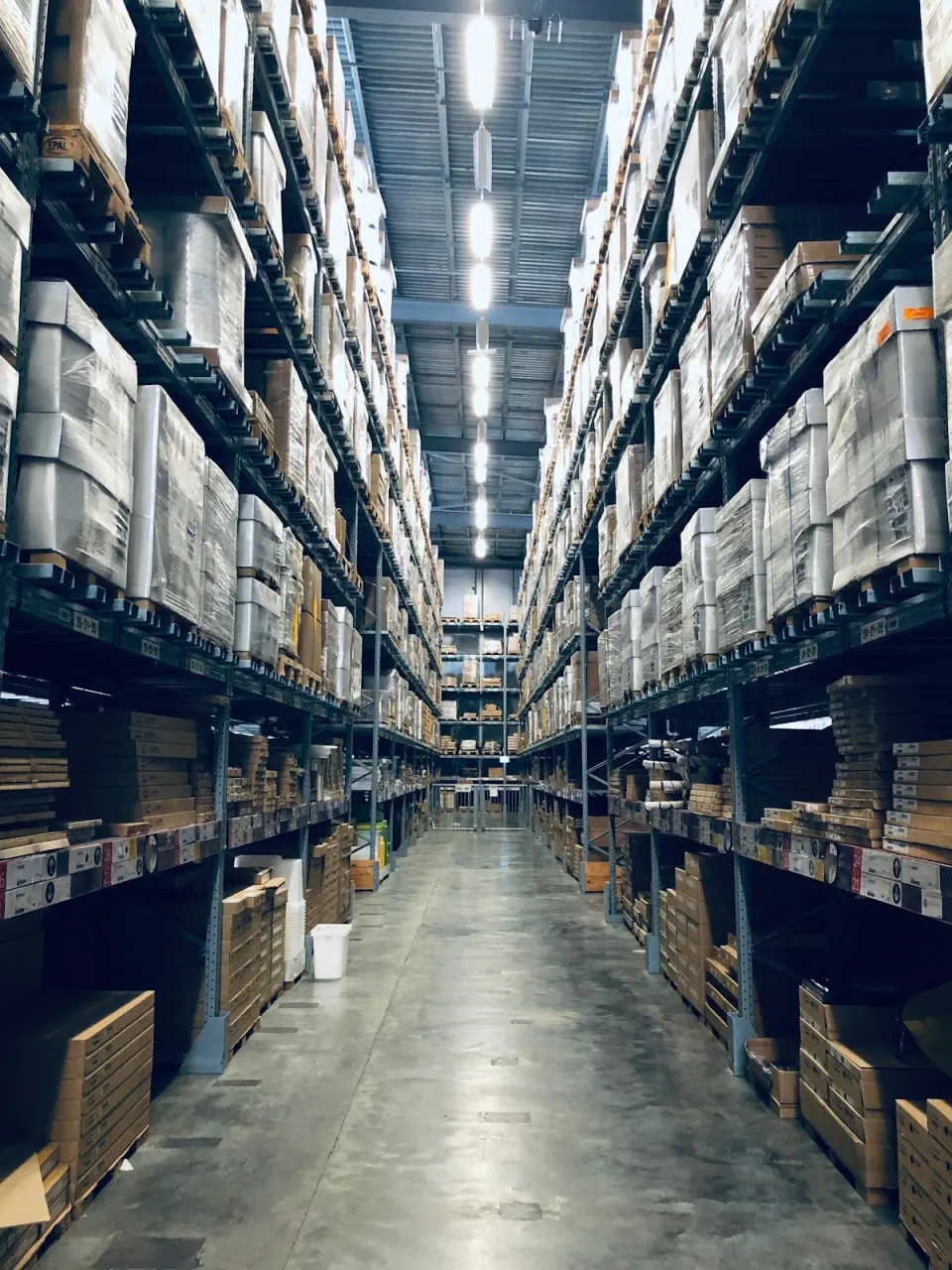 Modern logistics warehouse aisle with pallet racking